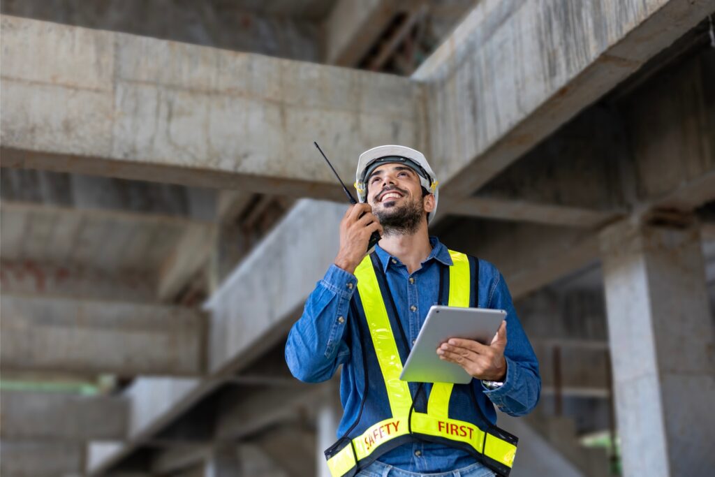 Building inspector reviewing commercial building structure